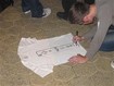 Drawing his own shirt