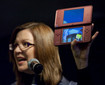 Cammie Dunaway shows off the Nintendo DSi XL