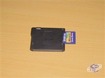 SD card sliding into Play-Yan cart