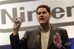 Reggie with the Game Boy Micro