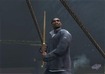 Clutching the wooden sword
